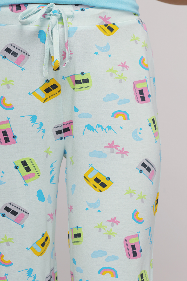 Colorful patterned shorts featuring camper vans and nature motifs.