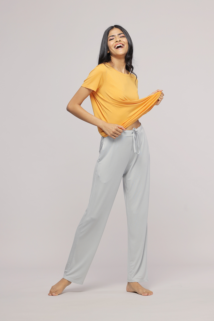 Zen Grey Straight Pajama Set with cheerful model in casual outfit.