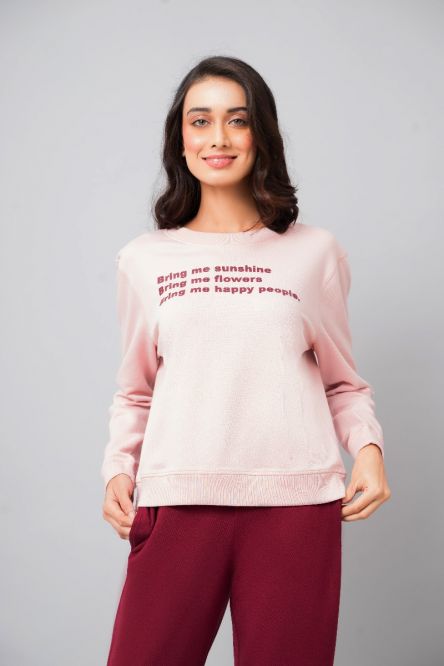 Happy People Sweatshirt in soft pink with cheerful text design.