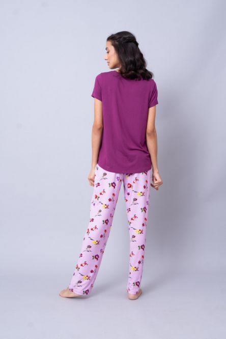 Cozy Winter Romance Pajama Set with floral print and purple top.