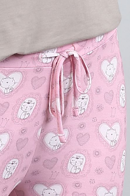 Cute pink kitty pajamas with heart patterns and adjustable tie.